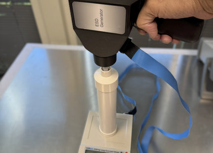 ESVM High Voltage Electrostatic Voltmeter measuring ESD generator output at 8042V for voltage verification in electrostatic discharge testing.