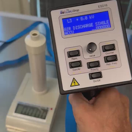 ESVM High Voltage Electrostatic Voltmeter displaying 8.0 kV for ESD generator voltage verification in a lab setup with digital readout.